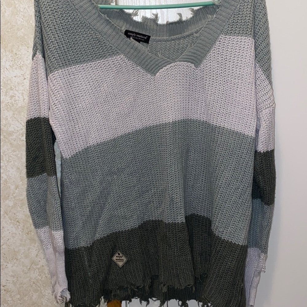 Distressed green striped sweater